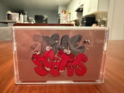 New 2020 Travis Scott x Kaws "The Scotts" Red Cassette Tape - Image 1 of 3
