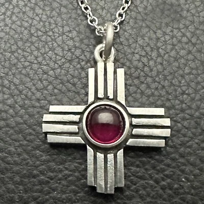 MJG STERLING SILVER ZIA CROSS. 8mm LAB RUBY CAB + CHAIN. GUITAR PLAYER. 12 grams - Image 1 of 4