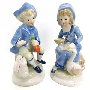 Set 2 statuine olandesi in ceramica - ragazza e oca e ragazzo e coniglio alte 7" smaltate - Foto 1 di 12