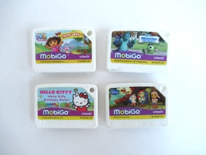 Lot Of 4 Vtech MobiGo Games  Jake & Pirates, Monster University Dora Hello Kitty - Picture 1 of 2