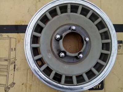 Cubierta de rueda tapacubos única Ford 15" 1989-96 Bronco, F150 OEM Foto 1 de 2