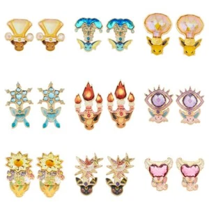 Pokemon Center Accessorio Originale Terastal Eevee Evoluzione Orecchino - Foto 1 di 94