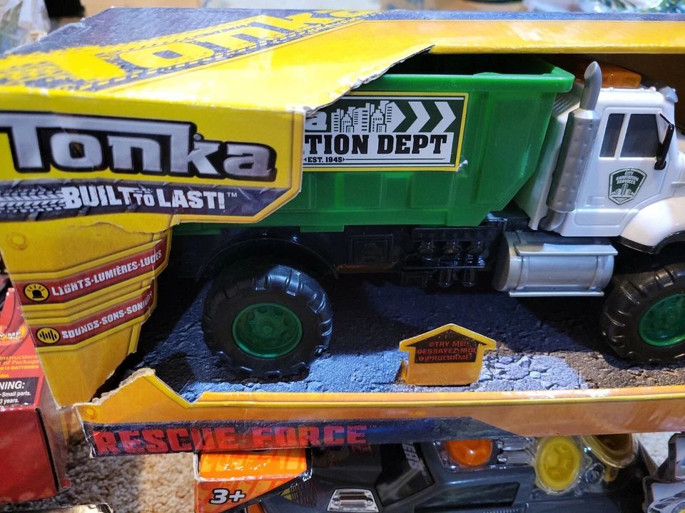 Tonka Rescue Force Lights and Sounds Sanitation Dept Dump Truck -