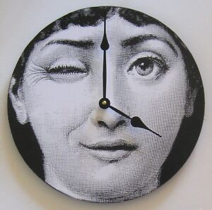 Wall clock.  Fornasetti digital image of a woman winking. Handmade in USA.