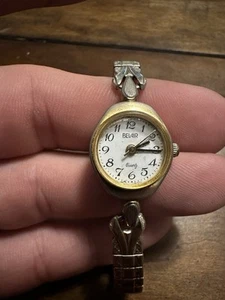 Belair/ Sharp Women’s Wrist Watch. Gold Toned. Silver Band - Picture 1 of 2