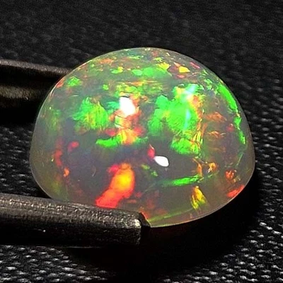 NATURAL AAA+VVS MESMERIZING COLORPLAY ROUND CABOCHAN ETHIOPIAN WELO OPAL 2.00CTS - Image 1 of 3