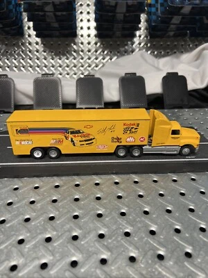 1:64 Winross Transporter Semi Yellow Kodak Kenworth- Coin Bank w/Lock - Image 1 of 4