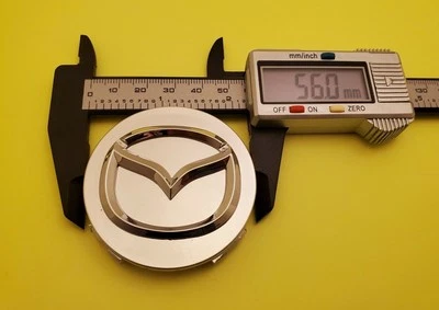 JUEGO 4X 56mm Tapacubos Centrales Plateados - Mazda 3/5/6, Miata, RX 8, CX-3/5/7/9.. Foto 1 de 4