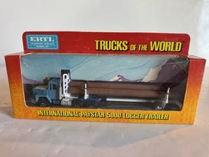 Ertl 1:64 Trucks Of The World International Paystar 5000 Truck & Logger Trailer - Picture 1 of 9
