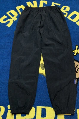 Pantalones cortavientos Sierra blancos grandes negros de colección Foto 1 de 4