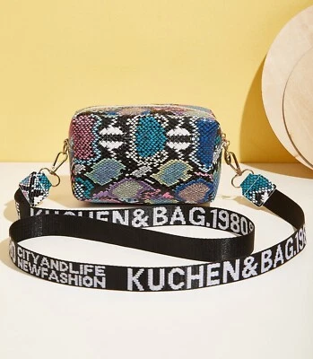 Mini bolso domo de piel de serpiente para mujer Foto 1 de 4