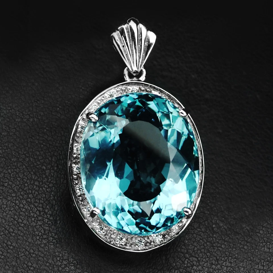 Colgantes hechos a mano de plata de ley 925 ovalados aguamarina azul marino prístino de 24,90 quilates Foto 1 de 4