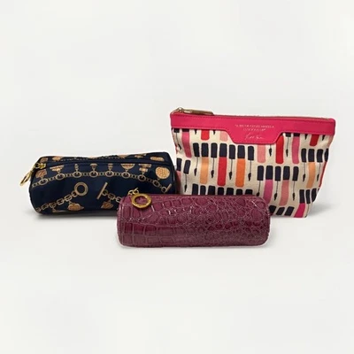 Lote de tres bolsas de cosméticos y artículos de tocador Estée Lauder Foto 1 de 4