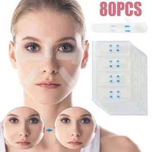 80 Pezzi Cerotti Antirughe Istantaneo Viso Collo Occhi Lifting Viso Nastro a V - Foto 1 di 10