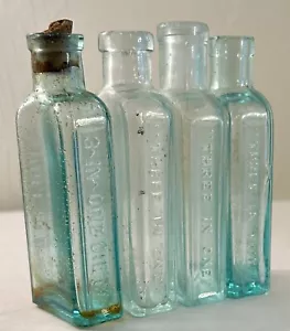 Antique Three In One 3 in 1 Oil Co Aqua Glass Bottle lot 4 bike gun lube 3 3/4" - Picture 1 of 7