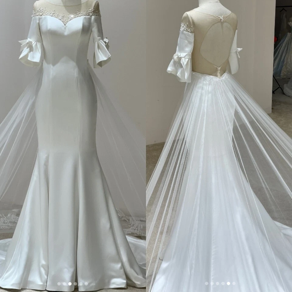 Vestidos de novia de sirena sin espalda con cuentas con tren desmontable satinado vestidos de novia Foto 1 de 4