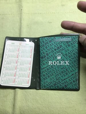 Cartera Rolex vintage/soporte de papel; folleto de traducción; juego de calendario 1981-1982 Foto 1 de 4