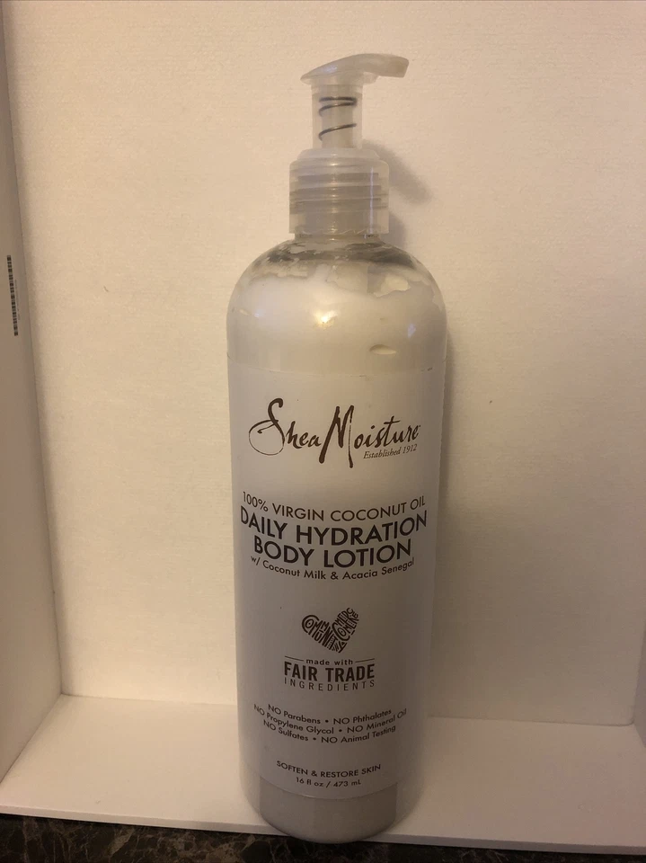 Loción corporal hidratación diaria 100 % aceite de coco virgen Shea Moisture 16 oz Foto 1 de 1