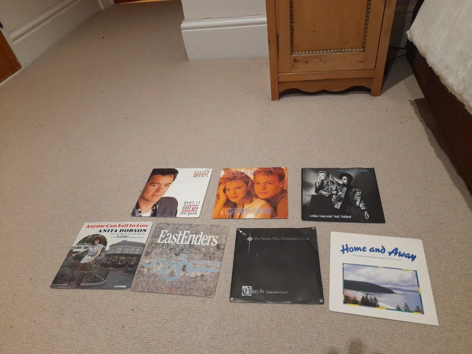 Collection of 7 TV Soap Opera 7" vinyl Records Eastenders Home & Away Neighbours - Image 1 of 1