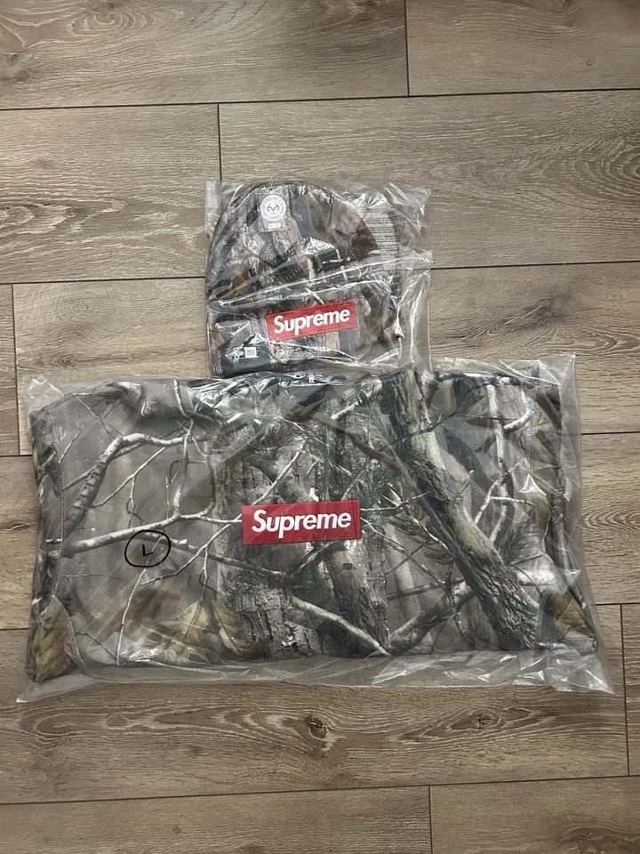 SUPREME OTOÑO INVIERNO 2025 CAMUFLAJE REALTREE GORRO Y LOGOTIPO DE CAJA SUDADERA CON CAPUCHA LRG NUEVO CON ETIQUETAS EN MANO  Foto 1 de 4