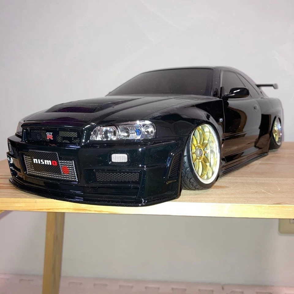 Tamiya GT-R R34 RC solo carrozzeria auto 1/10 nero parti fittizie... - Immagine 1 di 4