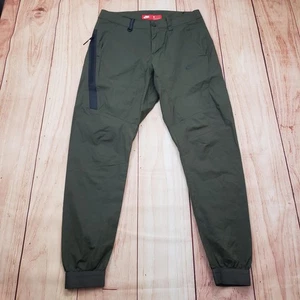 Nike Hose Herren 30 Olivgrün Jogger Bündchen Stretch Windbreaker Tapered Swoosh - Bild 1 von 8