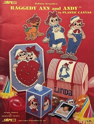 RAGGEDY ANN & ANDY in PLASTIC CANVAS Book S-92 - Image 1 of 2