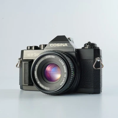 EXCELENTE CÁMARA RÉFLEX COSINA CT-1G + COSINON-S 50 mm F/2 MF Foto 1 de 4