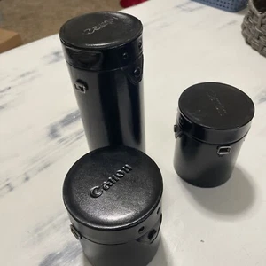3 estuches diferentes para lentes CANON genuinos - USADOS - SIN LENTES - Imagen 1 de 9