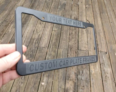 BLACK ON BLACK PLASTIC ENGRAVED CUSTOM PERSONALIZED License Plate Frame - Image 1 of 4