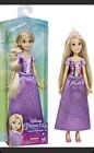 New in box Disney Princess Royal shimmer Rapunzel 11 inch Doll. Free shipping 