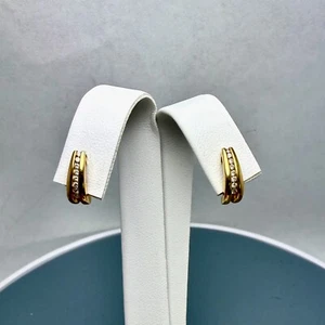 Boucles d'oreilles demi-cerceau diamant serties de canaux 2,4 g or jaune 14 carats 0,20 ct TW - Photo 1/16