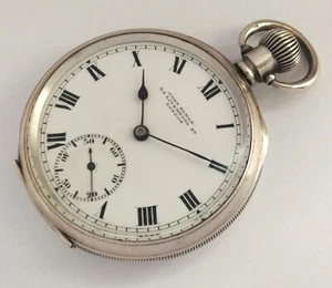 RELOJ ANTIGUO BOLSILLO CUERDA PLATA JOHN ELKAN HECHO EN SUIZA - Imagen 1 de 4