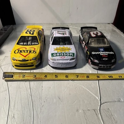 3 NASCARS Die Cast Ford Taurus Cheerios 2-Monte Carlos Grissom/Goodwrench Nice - Image 1 of 4