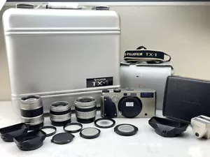 Ex+ fotocamera Fujifilm TX-1 +45 mm f/4, 90 mm f/4, kit 30 mm f/5.6 Hasselblad Xpan - Foto 1 di 12