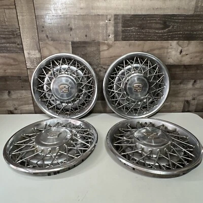 JUEGO 1975-1985 Cadillac DeVille Calais Fleetwood 15" tapacubos de alambre cubiertas de rueda Foto 1 de 4