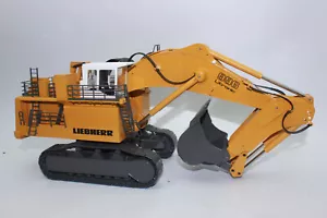 Escavatore a benna profonda Conrad 2916 01 Liebherr R 996 giallo 1:50 NUOVO con scatola originale - Foto 1 di 7