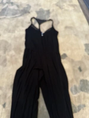 Espléndido mono de una pieza pantalón negro nuevo sin etiquetas estilo parte inferior ribete de encaje medio Foto 1 de 4