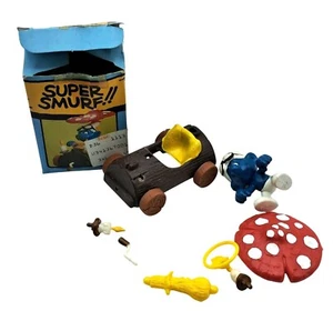 Juego de estatuillas vintage de coche de troncos Schleich Super Pitufo con caja - Imagen 1 de 8