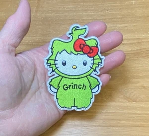 Hello Kitty Grinch Kostüm bestickt Bügelbild Patch - Bild 1 von 2