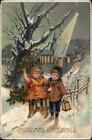 Christmas Little Boy And Girl Haul Christmas Tree At Night C1910 Postcard