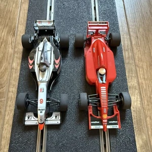 Scalextric C2124 McLaren MP4/10 & C2115 Ferrari 643 PAIR - Imagen 1 de 9