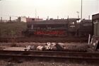 PHOTO  LMS STANIER 8F 2-8-0 48305 STANDS IN THE YARD AT LOUGHBOROUGH STATION ON
