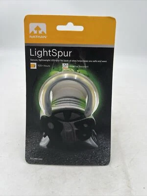 Luz LED para pies Nathan Sports Safety LightSpur Foto 1 de 2