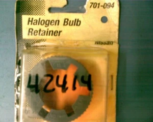 MOTORMITE/DORMAN 42414 HEADLAMP BULB REPLACEMENT RETAINER - Nissan various - Bild 1 von 1