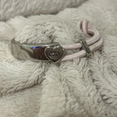 Brazalete Brazalete Elástico Corazón Juicy Couture Tono Plata y Rosa Foto 1 de 4