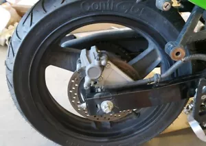 2007 Kawasaki EX500R Ninja rear wheel new tire - Picture 1 of 6
