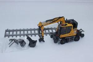 Excavadora bidireccional Conrad 2237 Liebherr RE 25 Rail Road 1:50 NUEVA EMBALAJE ORIGINAL excavadora - Imagen 1 de 15