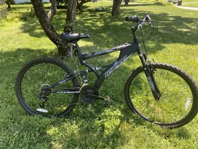 Bicicleta de montaña Shimano de aluminio, suspensión delantera + amortiguador Foto 1 de 4