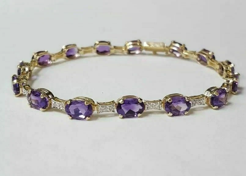 Brazalete tenis amatista creado en laboratorio corte ovalado de 13 quilates enchapado en oro amarillo de 14 quilates Foto 1 de 4
